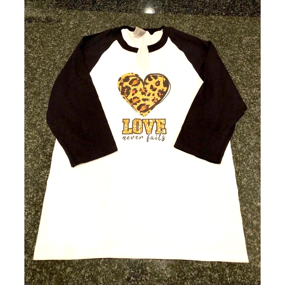 ‘Love Never Fails’ Raglan 3/4 length T Shirt